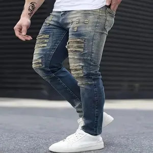 Men’s jeans made from stretch denim, ripped detailing, slim fit, dark blue, distressed look, suitable for all seasons