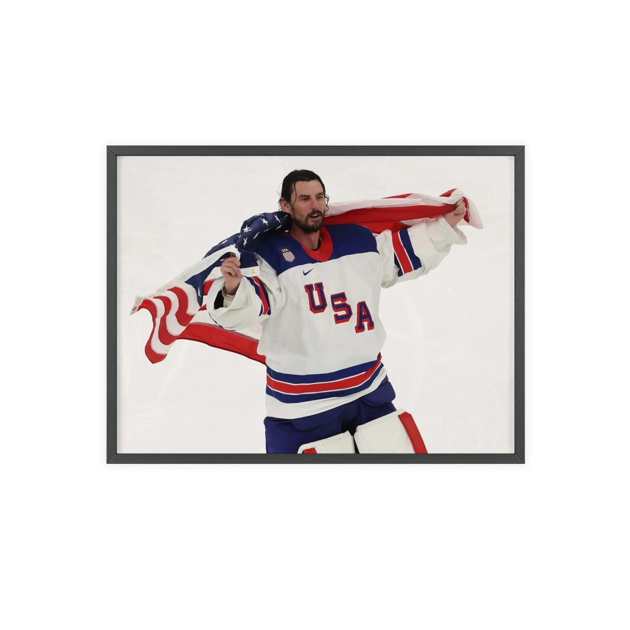 6 - Connor Hellebuyck with flag