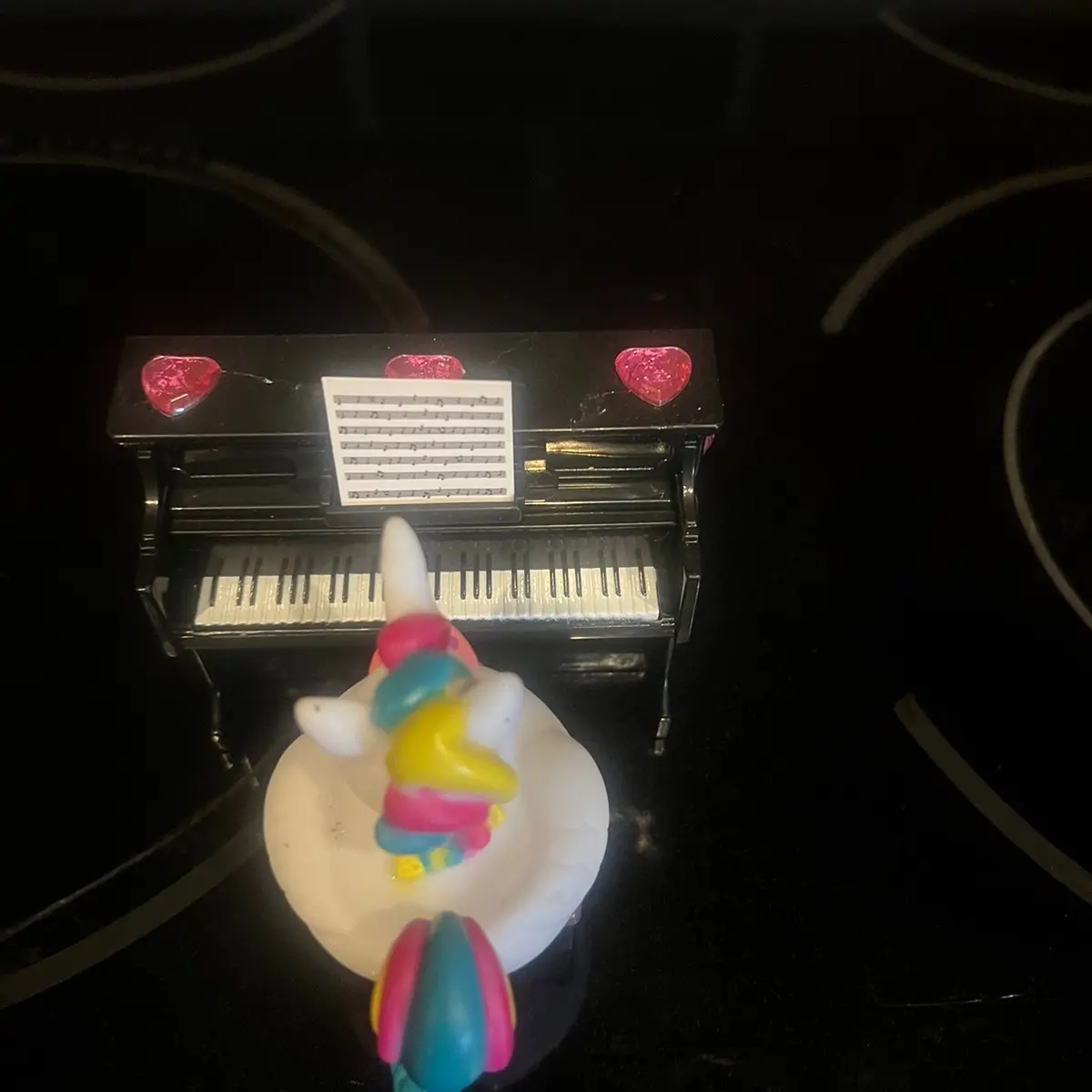 Unicorn rubber duck sitting at piano Unicorn rubber duck sitting at piano