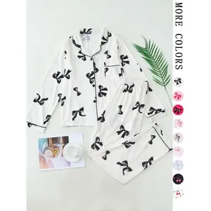 Women’s Christmas two-piece pajama set featuring a full bow print, round neckline, pocketed shirt and matching pants; casual and comfortable long-sleeve top and pants set; suitable as women’s sleepwear for spring and autumn.