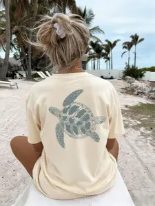 TikTok Viral 2026 Women's Oversized Sea Turtle Graphic T-Shirt - Back Print Coastal Marine Life Short Sleeve Crew Neck Tee - Y2K Coquette Aesthetic Beachwear,Vacation, Beach, Brunch, Daily Wear - Trendy Summer Outfits for Teen Girls & Young Women