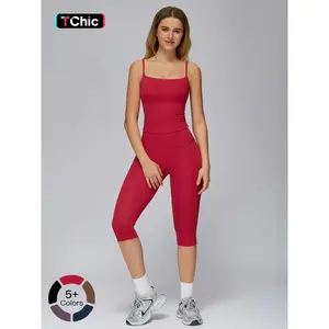 Women’s yoga set featuring tight mid-thigh pants and a casual sports tank top for outdoor running and fitness—comfortable workout gear, fitness sportswear set