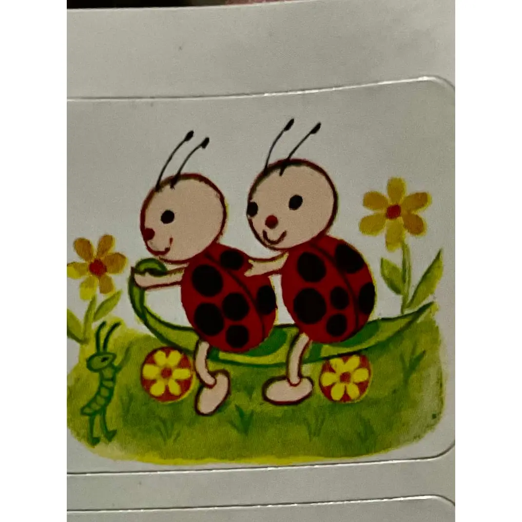 Vintage Ladybugs Riding on a Leaf