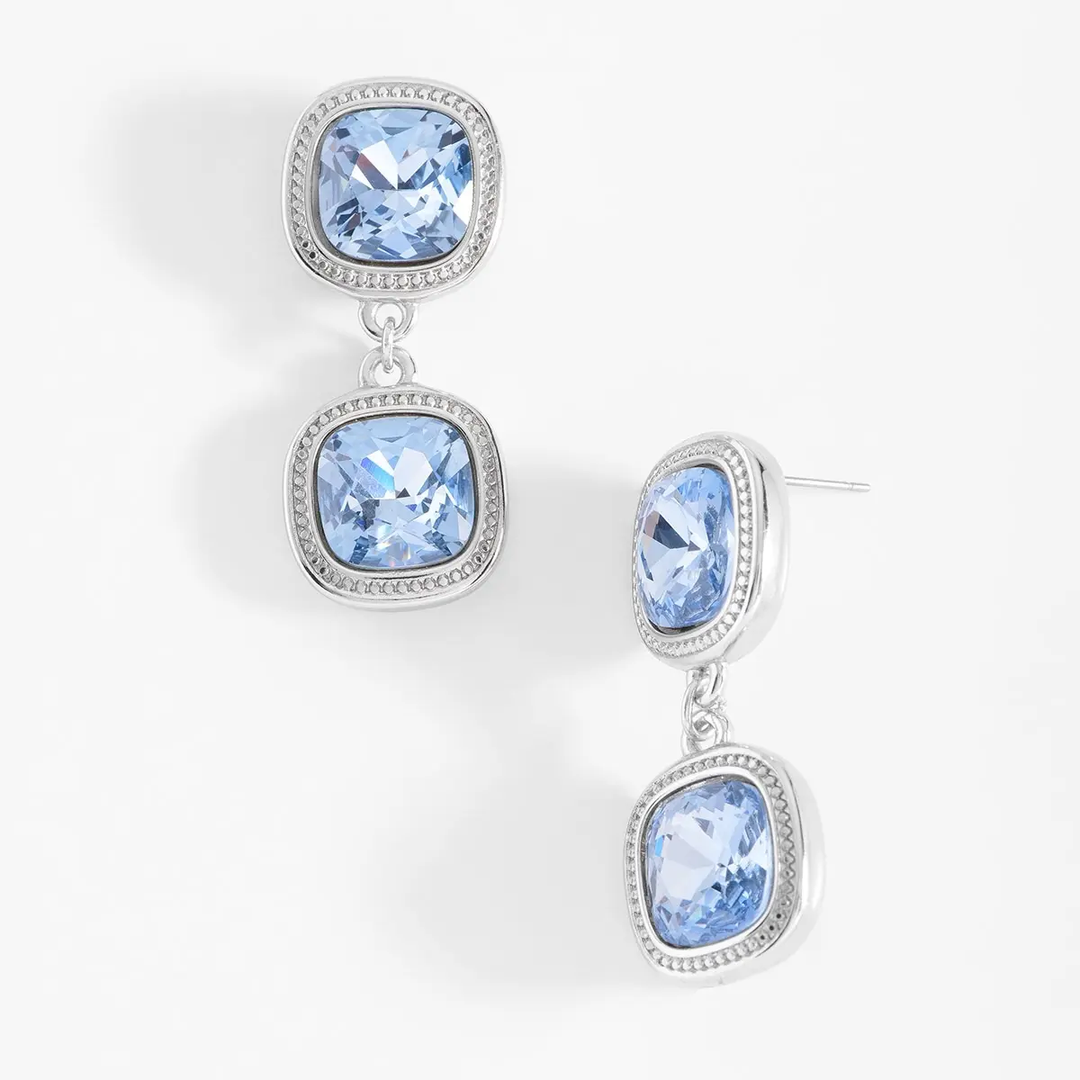 Platinum plated post earrings with blue stones
