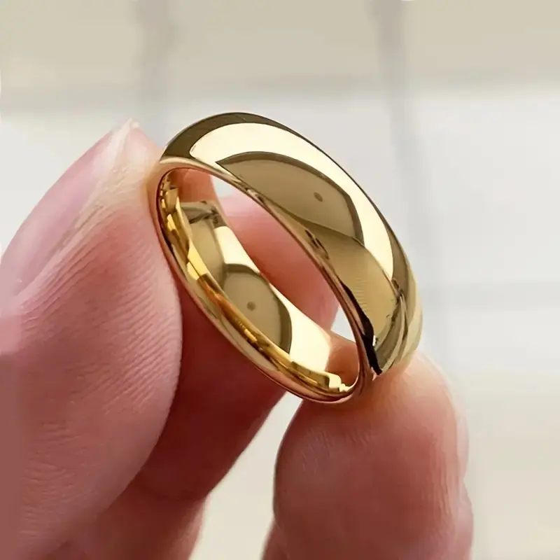 An elegantly designed 6mm curved titanium stainless steel classic gold wedding ring, gold plated, suitable for all seasons, daily wear and gift giving occasions, for both men and women