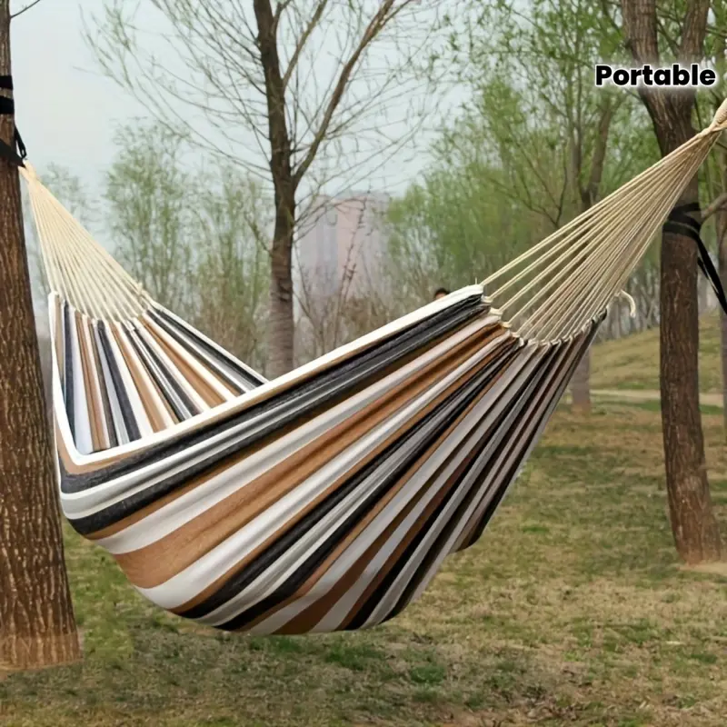 Brown fabric hammock, Patio hammock, designed for single use, features anti roll design - supports up to 330 pounds, comes with straps and a portable storage bag - suitable for outdoor, camping use, making it an ideal choice for travel