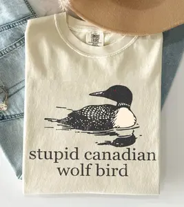 [ Sale Up To 40%] Comfort Colors Stupid Canadian Wolf Bird Shirt, Hockey Romance LGBT Hockey Fan Gift, Heated But Devote Movie