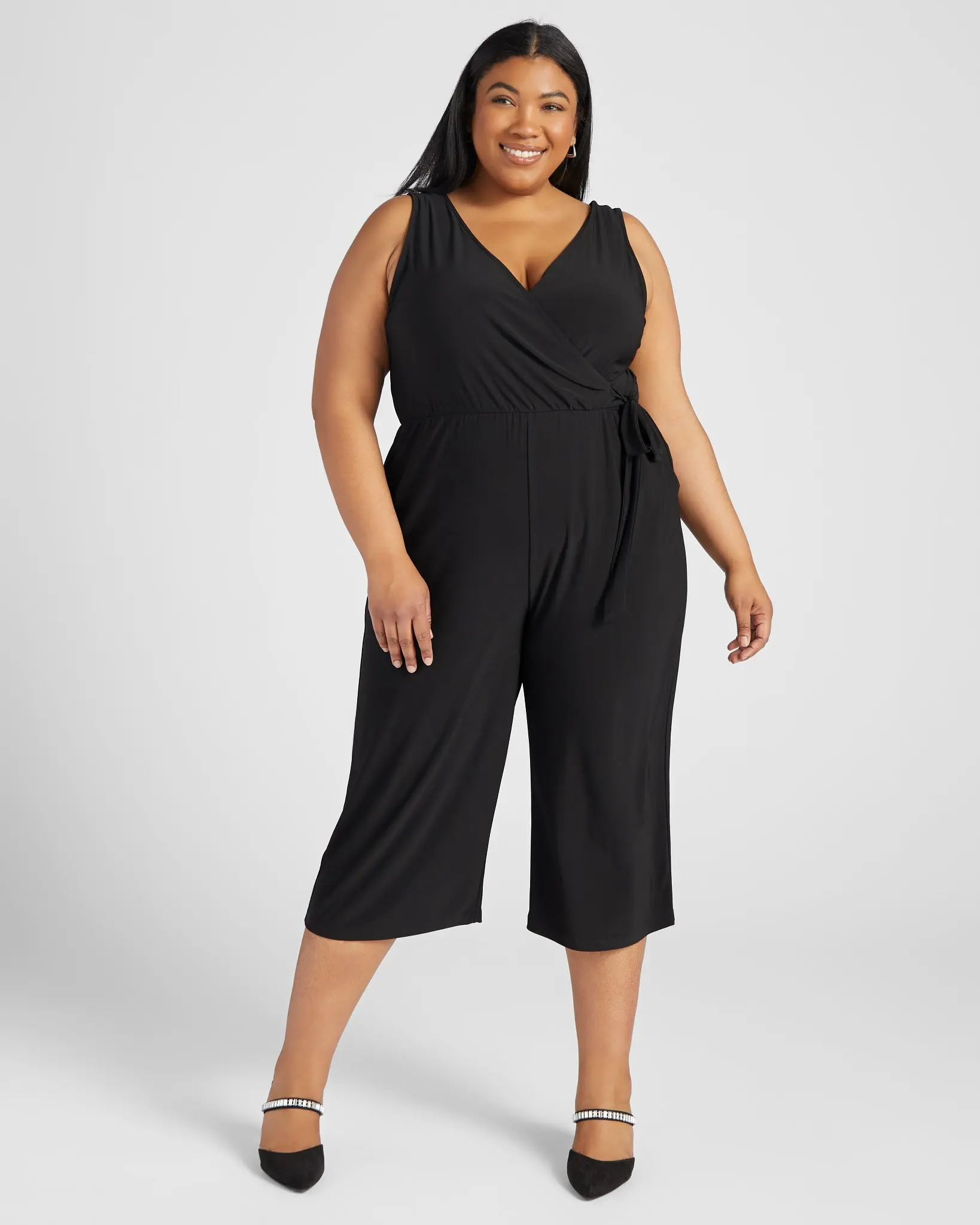 Women's Plus Size Sleeveless Faux Fabric Faux Wrap Cropped Jumpsuit - Relaxed Fit, Breezy Wear, Hip Pockets, Side Tie Top, Beachy Romper & Overall Set