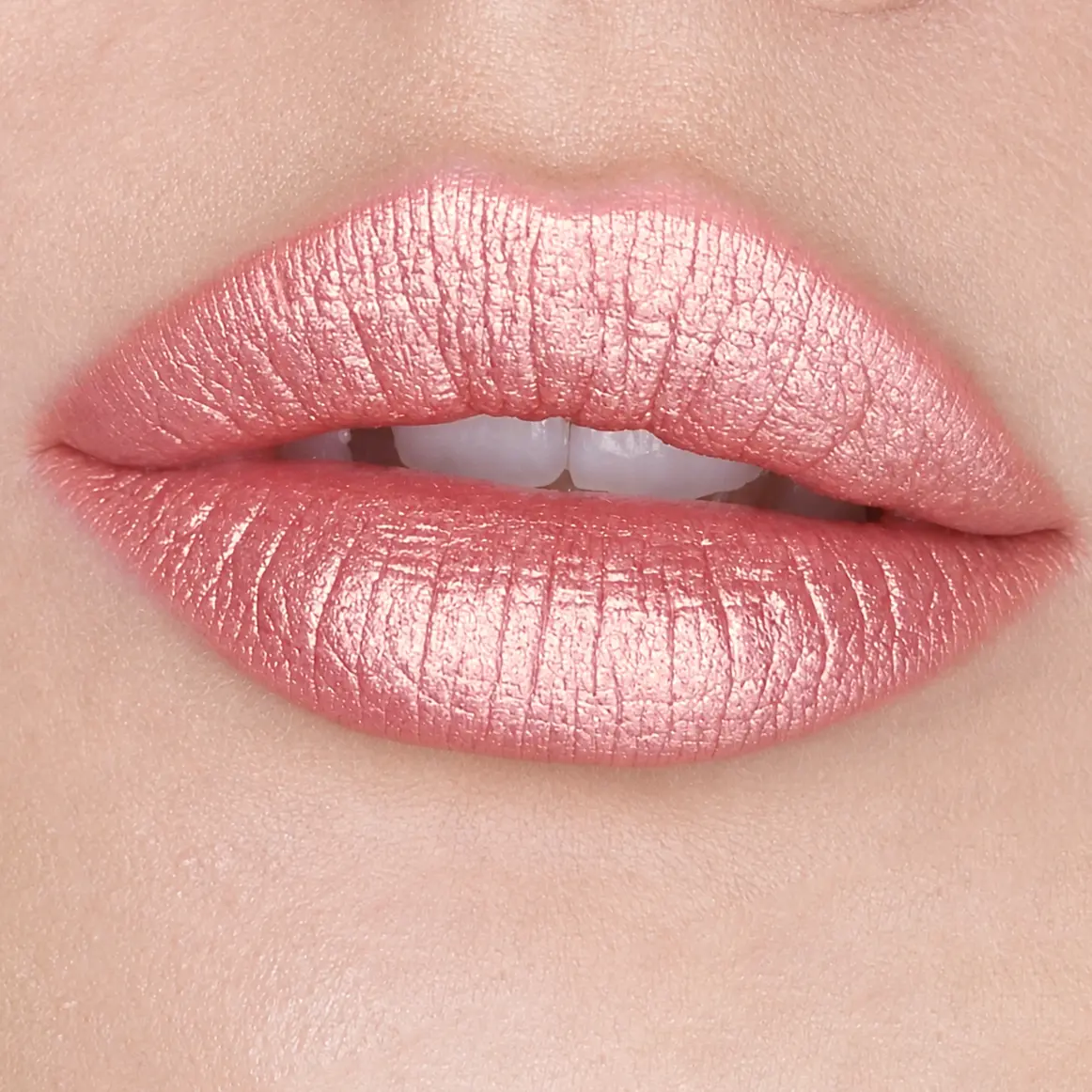 Glamour Crème | A Frosted Blushing Peach Lipstick With Gold and Rose Shimmer