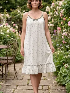 Womens Cream White Spaghetti Strap Nightgown With Small Floral Print Ruffle Hem And Decorative Details Soft Fabric Comfortable Sleepwear For Spring Summer Cozy Home Wear Or Romantic Lounge Sleepwear Dresses