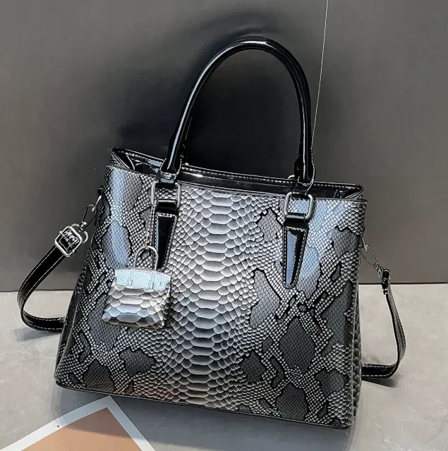 A169-Elegant Snake Print Handbag with Silver Lock Detail and Adjustable Strap