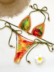 2026 new printed patchwork mini bikini—fashionable, sexy two-piece women’s swimsuit set featuring a low-rise tie design; casual beachwear/swimsuit for vacations and hot springs. Halter Swimwear swimsuit for women thong bikini bathing suit