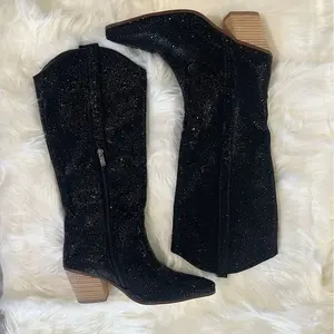 Rhinestone knee-high cowboy boots for women feature sparkling bling details, making them perfect as high knee cowgirl boots and go-go boots.