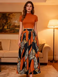 A women's set, Skirt top sets, featuring an orange fitted short turtleneck top paired with a color-blocked leopard geometric print wide-leg long skirt. The style is retro and unique, suitable for dinner parties, dates