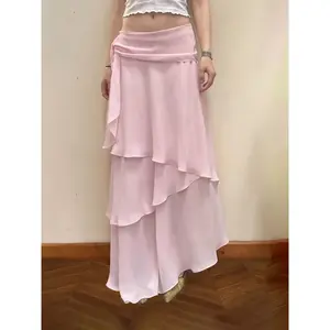 Elegant lightweight chiffon solid-color low-waist tie-up long skirt with an asymmetrical ruffled layered design; women’s loose A-line skirt for vacation style