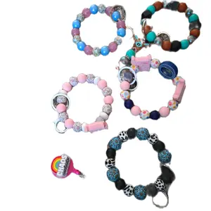 5 for $30 Beaded car charms and wristlet key chains.  These can be customized.