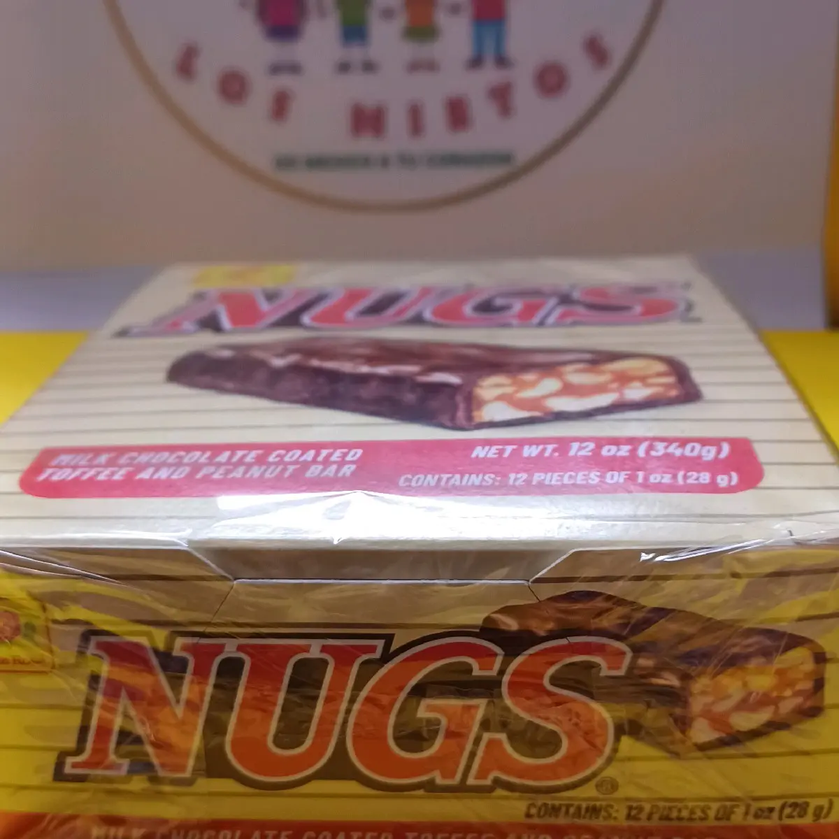 NUGS, MILK CHOCOLATE COATED TOFFEE AND PEANUT BAR