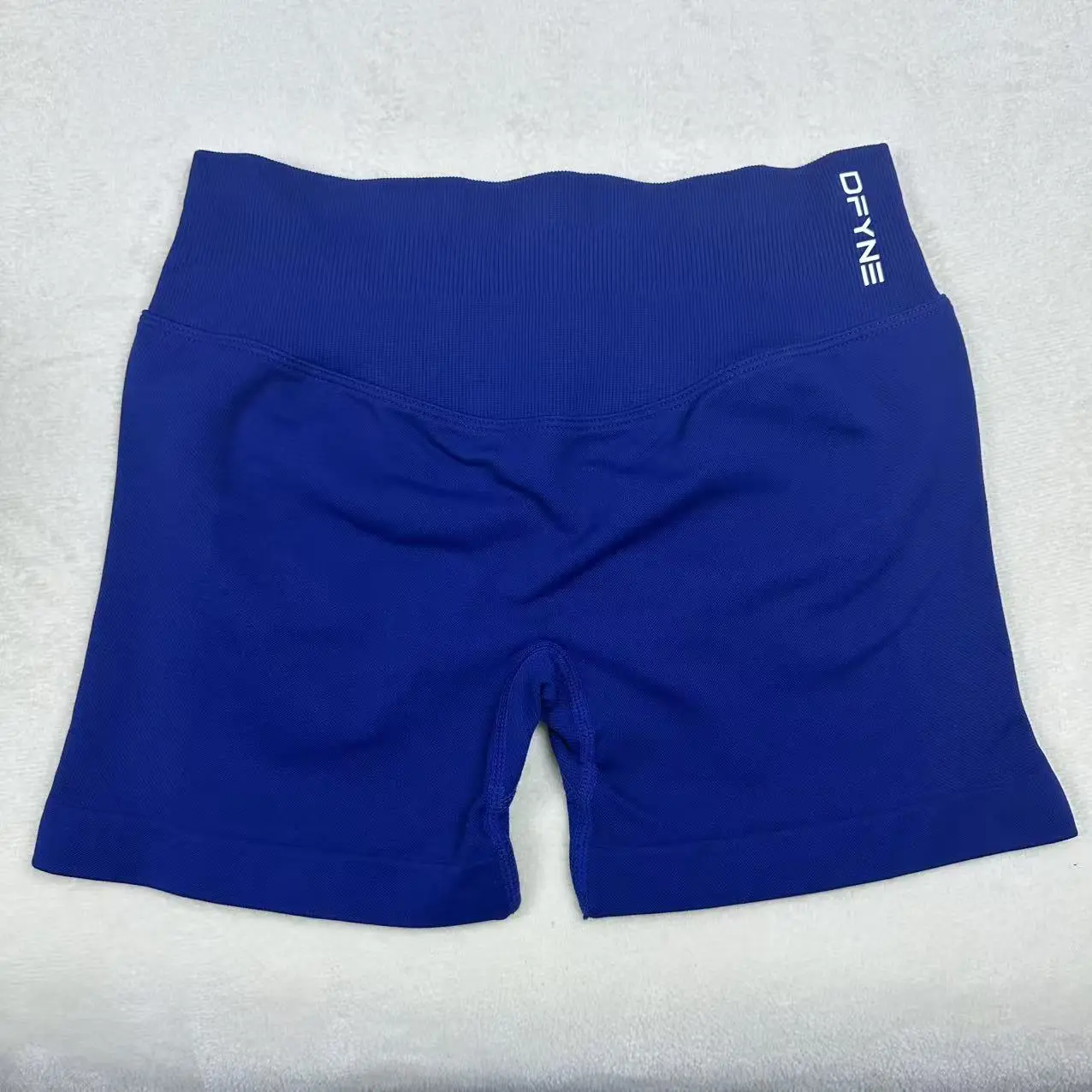 Impact Female Seamless Low-Rise Gym Shorts - 4.5" Inseam, Ribbed Band, Subtle Glute Contour, Compression Fit, Figure-Enhancing Women's Activewear for Casual Athleisure Outfits