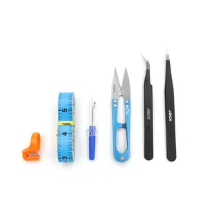 Jack 6-Piece Sewing Tool Set Includes 1 ring cutter, 1 seam ripper, 1 measuring tape, 1 pair of curved tweezers, 1 pair of straight tweezers, and 1 pair of small thread snips. Comes in box packaging. A practical sewing tool set.