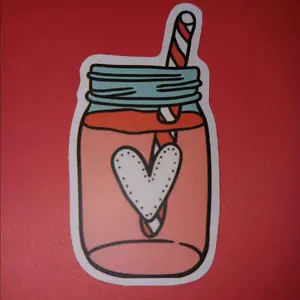 Pink mason jar with heart sticker