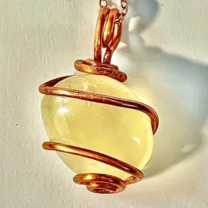Citrine Crystal Pendant wrapped in pure copper wire, on a rose gold plated copper necklace.