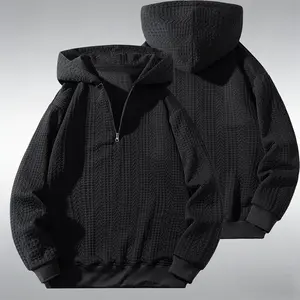 Unisex 3D jacquard cap hoodie, high-street casual style from a trendy brand; fabric with an outstanding faux slub texture. A minimalist half-zip front design is sleek and clean, while the hood adds a stylish, structured look. A relaxed drop-shoulder fit f