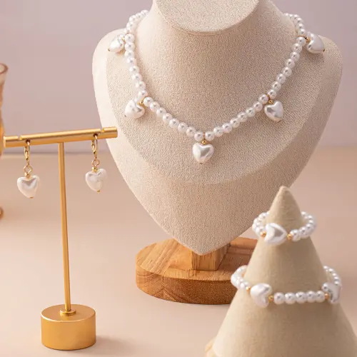 Four piece high end imitation pearl set,