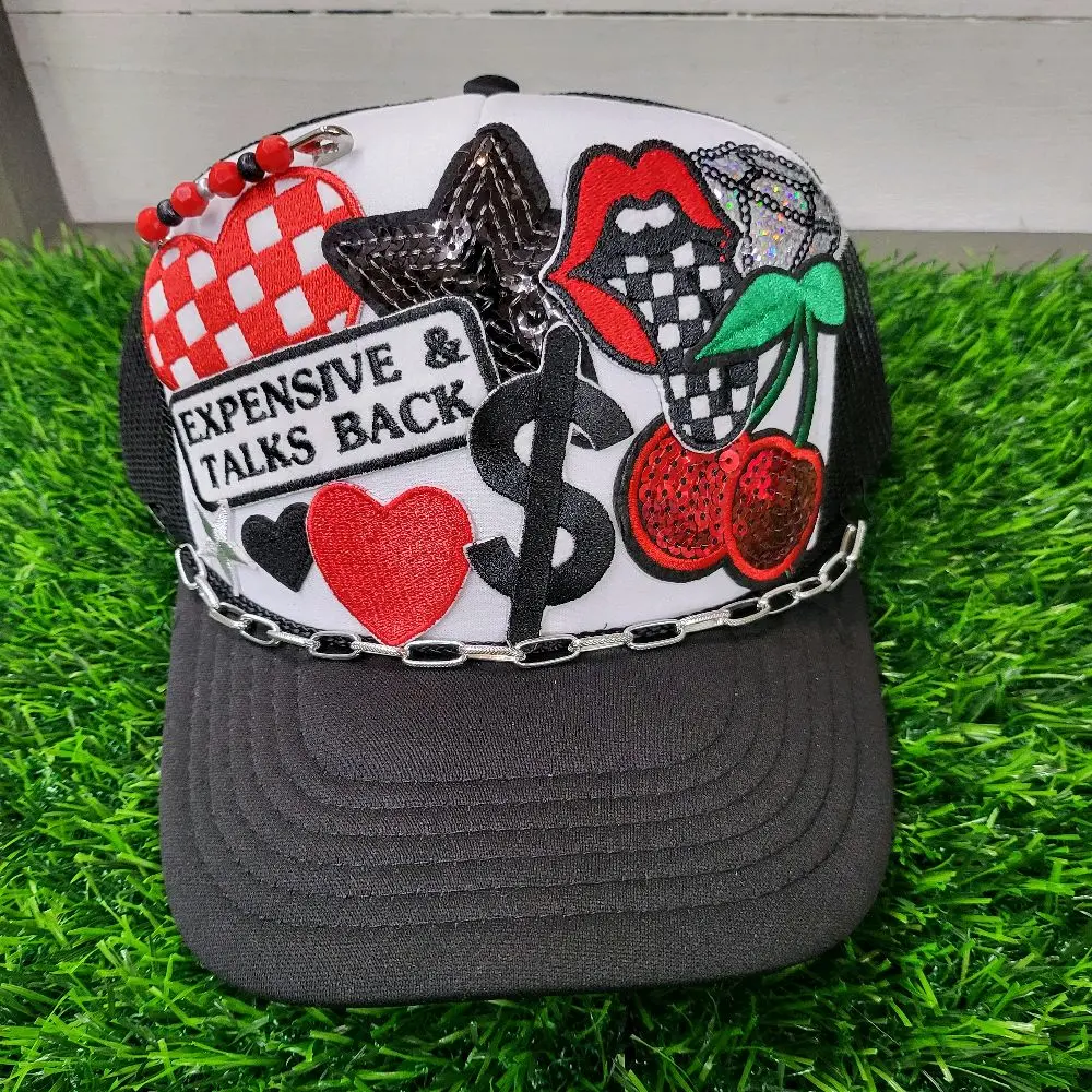 Expensive and talks back foam snapback trucker hat in red and black. funny