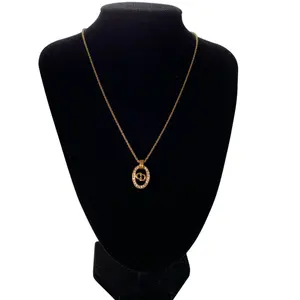 Pre-owned Dior CD logo pendant gold plated necklace authentic with COA and adjustable length