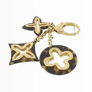 Pre-owned Louis Vuitton metal Bag Accessories Tortoise Shell Resin Insolence Key Holder and Bag Charm 2016