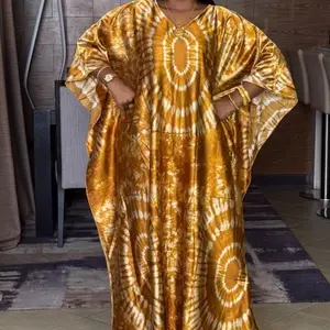 African Women's Kaftan in Golden Yellow with Circular Patterns and Long Sleeves
