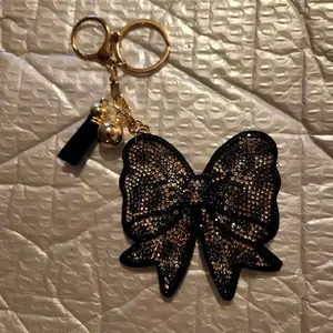 Glittery Black Butterfly Keychain with Gold Chain and Black Tassel