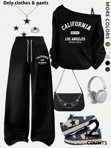 A teenage girl's Graphic top and wide-leg casual Pants; a loose-fitting, oversized casual long-sleeved top with a letter print paired with loose-fitting adjustable drawstring trousers; soft, suitable for women, and versatile