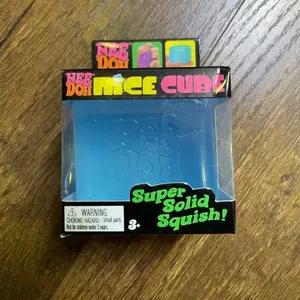 NeeDoh Nice Cube Blue - Satisfying Cube Squeeze Toy - Soft Squeeze Toy in Assorted Colors - Fun for Ages 3 and Up Soft Squishy, Cute Anxiety Relief Fidget Toy, with Steamer Box,Soft Squeeze Decompression Dough for Adults