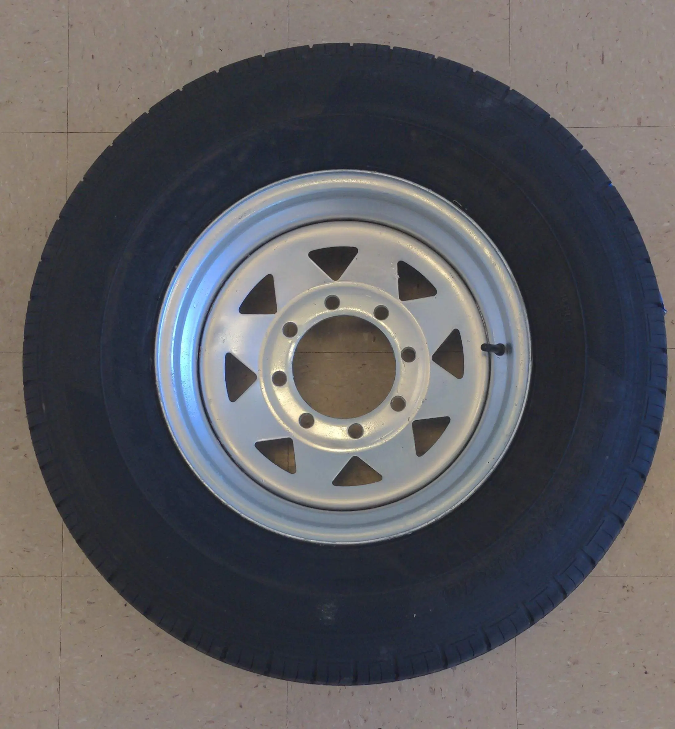 ST235/80R16 LRE 8 ON 6.5 Silver Modular Tire on Rim