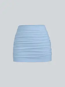 Women's Ruched Mini Skirt: Sculpted Fitted Silhouette - Fabric Solid Color Beach Cover-Up Essential, Effortlessly Elegant for Swimwear & Coastal Strolls.