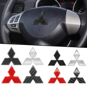 ABS Carbon fiber 3D Car Steering Wheel Center Emblem Sticker For Mitsubishi Outlander Lancer 10 9 EX ASX RALLIART Eclipse Pajero L200 Colt EVO Competition Interior Decoration Sticker Accessories