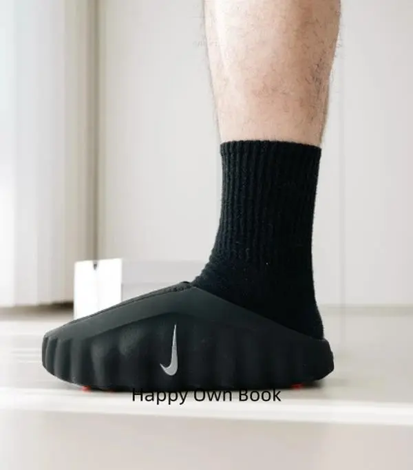Max cushioned matte black slide clogs, one-piece molded perforated breathable EVA upper, wavy serrated thick shock-absorbing outsole with orange massage dot insole eases foot pressure for shower, home & street daily wear, grab yours now