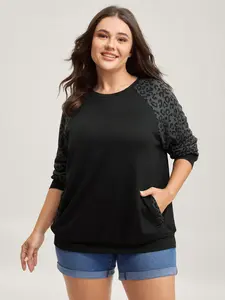 BloomChic Women's Animal Print Statement-Sleeve Spliced-Pocket Sweatshirt - Black Oversized Long-Sleeve Basic Fit Top with Spandex Fabric Fit Womenswear Swimweek
