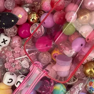 small scoop of beads for pen making