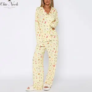 Women’s pajama set featuring a long-sleeve fruit-print shirt and pants sleepwear loungewear