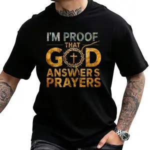 Men's Christian-themed T-shirt – "I am proof that God answers prayers"; decorated with a gold crown, cross, and lettering; suitable for church gatherings, Easter, and Christmas; crew neck, short sleeve style.