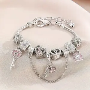 Multi colored rhinestone charm unique bracelet - hollowed out bone claw print, heart lock pendant, female snake chain design - suitable for daily wear and vacation