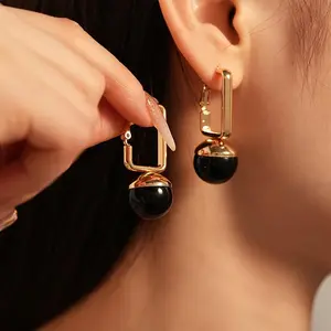A Pair of Luxurious Vintage-Style Geometric Earrings.
