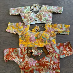 Rajasthani Blouse Designs for Sarees and Lehengas - Vibrant Paisley Patterns in Yellow and Orange - Perfect for Traditional Wear