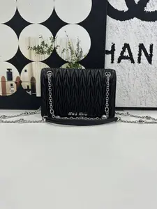 Pre-owned miu miu Black Crinkled Leather Crystal Chain Bag