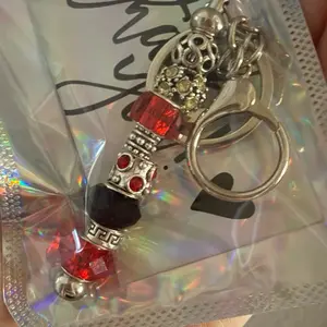 Keep Chains - Red and Black Beaded Keychain with Silver Tone Hardware and Decorative Charms
