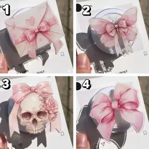 Cute pink bow phone grips a perfect Christmas gift to add charm and style to your holiday phone setup.