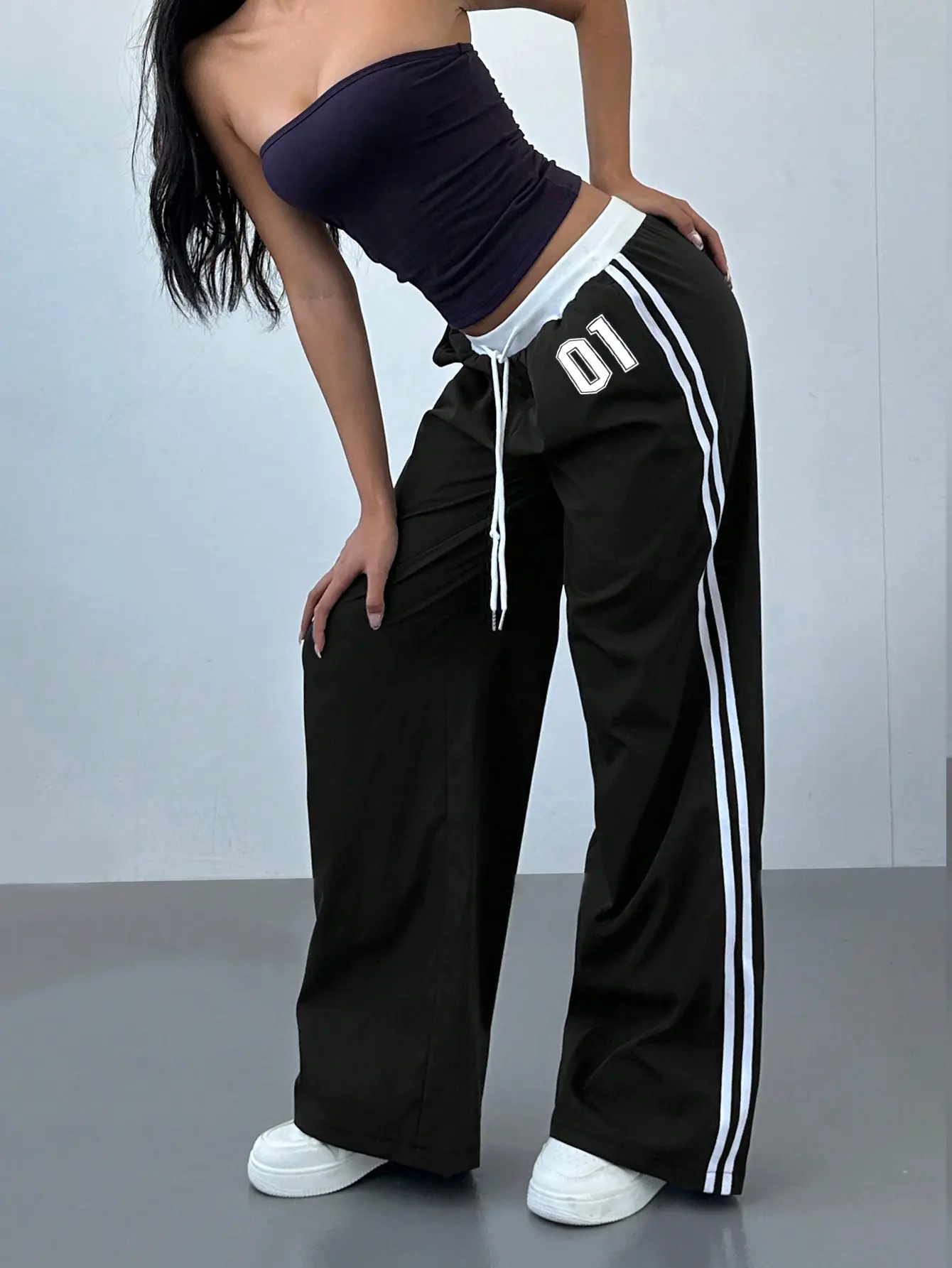 Women’s black wide-leg athletic sweatpants with contrasting white waistband, side stripes, number print, drawstring, high waist, loose fit, Y2K street casual long pants