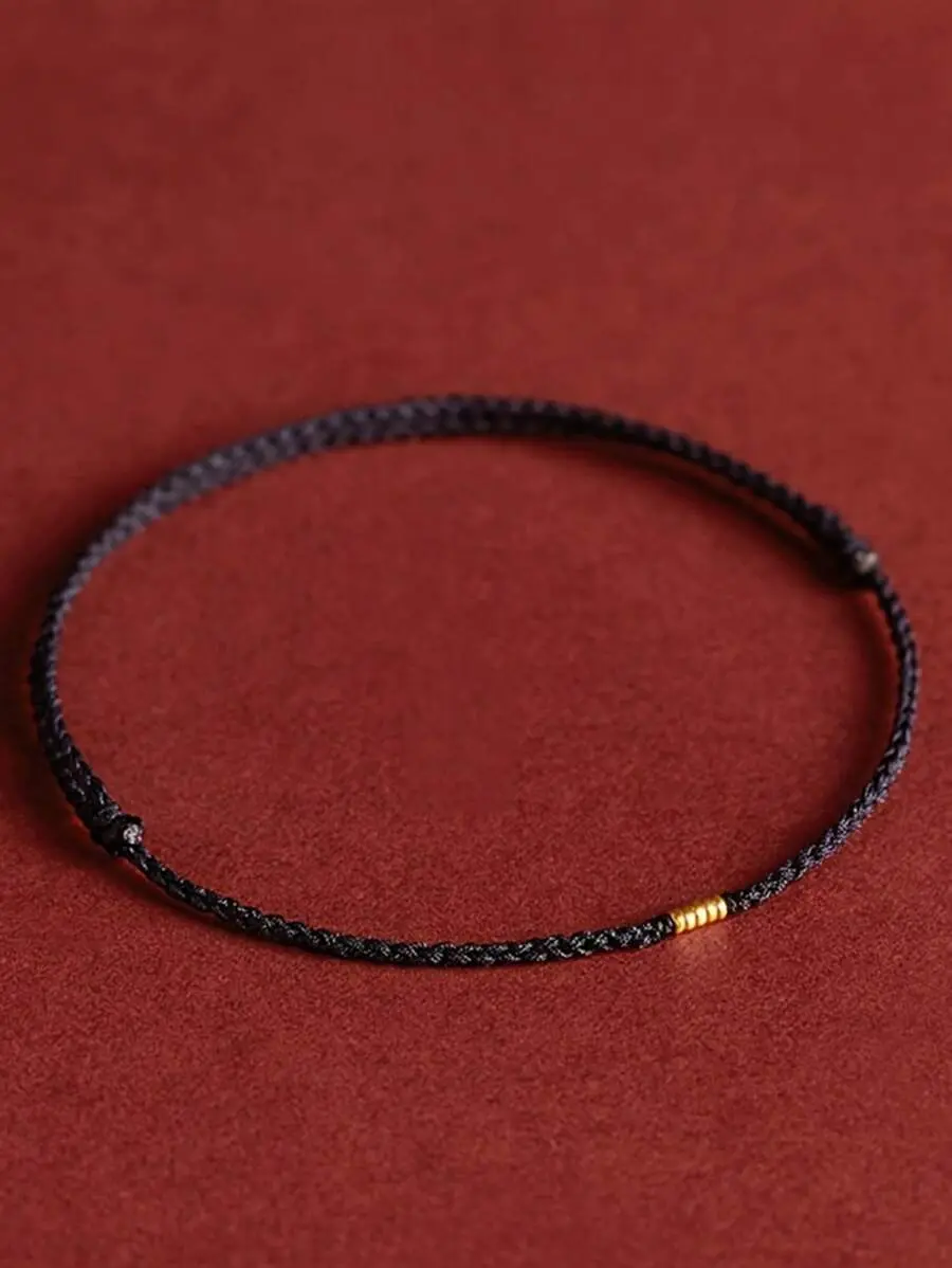 This minimalist handmade lucky bracelet features red and black threads and an adjustable design-great for men, women,and as a gift for someone special